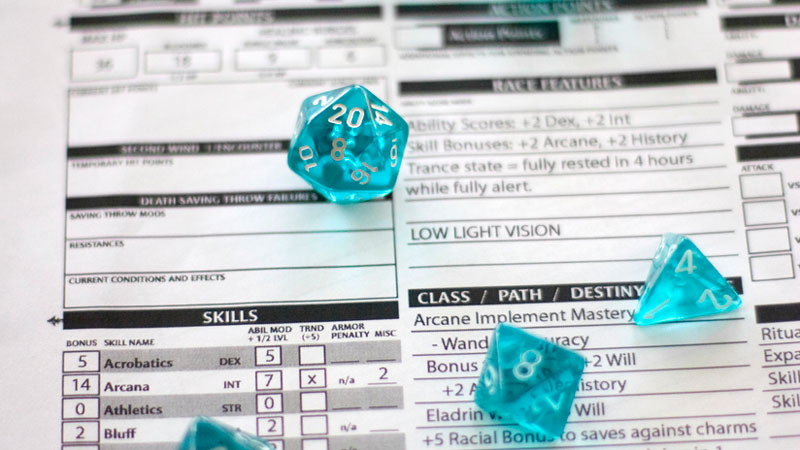 dungeons and dragons score sheet and dice